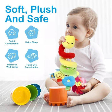 Baby Caterpillar Cot Spiral Toy For Pram Hanging Rattle shown wrapped around stroller handle and held by baby, soft plush tactile sensory toy for infants