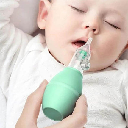 Baby Nasal Aspirator for Clear Breathing, Soft Silicone Tip being used gently on a sleeping infant with soft silicone tip and one-way valve