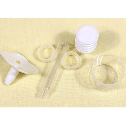 Balcherlam Baby Medicine Feeder Syringe Style Feeding Aid clear syringe-style feeder with rings, nipple, dosing cup and caps on light background