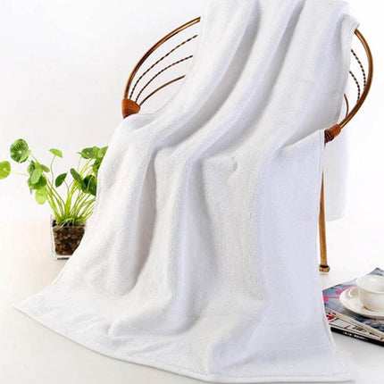 Bath Towel 70x140 cm For Everyday Home Use And Comfort - White 100% Cotton Plush Towel Draped On Chair