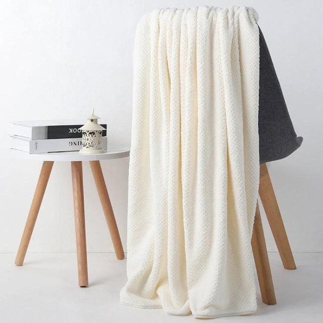 Bath Towel 70x140 cm For Home And Hotel Everyday Use - cream 6D microfiber towel with neat edges, ring hook and low-lint finish, staged on chair