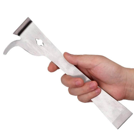 Bee Tools Cut Honey Knife Thumb Up Beekeeping Scraper Stainless Steel in hand showing thumb-type stainless steel scraper for hive maintenance