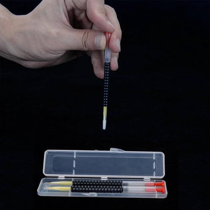 Beekeeping Transfer Needles 11 cm for Bee Larvae Kit held over clear storage case showing synthetic lightweight transfer needle