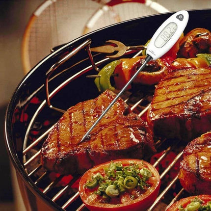 Benetech LCD Display Food Thermometer For Cooking And Grilling inserted into grilled steak showing clear LCD reading for accurate meat temperature monitoring