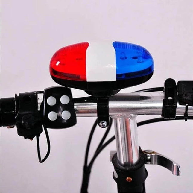 Bicycle 4 Tone Electronic Horn With LED Tail Light mounted on bicycle handlebars showing red and blue LED tail light and four-tone horn control