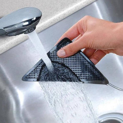 Black Anti-Slip Rug Corner Mats, 4-Piece Set, 15.5x10.5cm – Hand rinsing silicone corner mat under faucet to prevent rug curling on hard floors