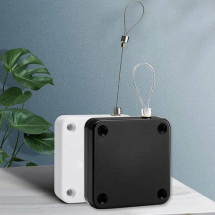 Black Automatic Door Closer For Sliding Doors Home Use - compact black ABS unit with stainless steel wire rope for sliding doors, nail-free or drilled install