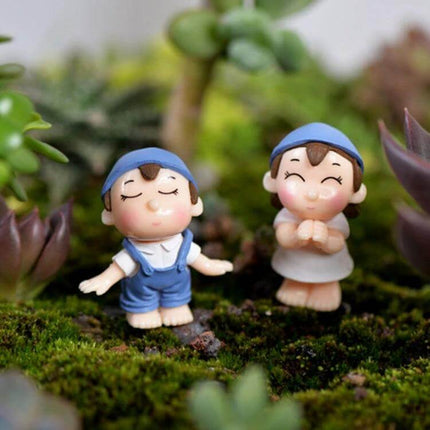 Lovers Smile Garden Miniature Ornaments for Dollhouse Landscaping Blue two tiny smiling blue-capped figurines on moss for miniature garden scenes
