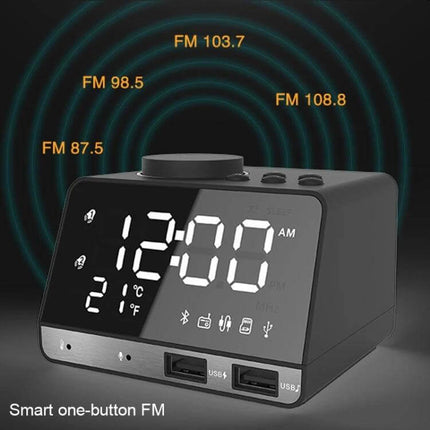 Bluetooth Alarm Clock Speaker Black for Bedside Use on nightstand showing digital time, temperature, FM radio frequencies and dual USB charging ports