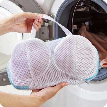Bra Washing Bag Mesh Laundry Pouch For Travel Underwear protected bra in mesh pouch being placed into washing machine