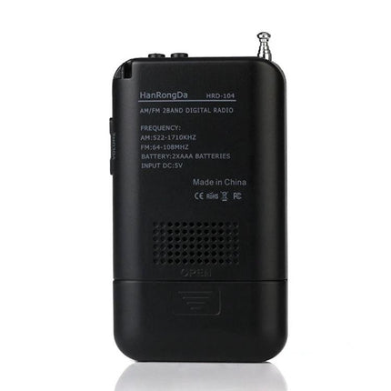 Mini Portable FM and AM Two Band Radio with Loudspeaker compact black travel radio showing back panel, speaker grill and retractable antenna