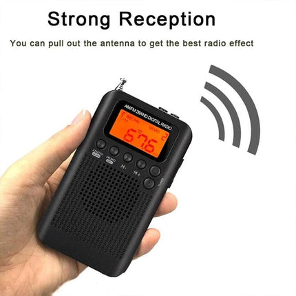 Mini Portable FM and AM Two Band Radio with Loudspeaker held in hand showing strong reception and extendable antenna
