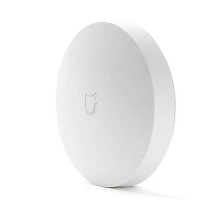 Xiaomi Intelligent Mini Wireless Switch for Smart Home Control - compact white round wireless switch for lights and outlets