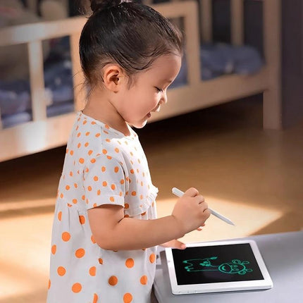 Xiaomi Mijia 20-Inch Electronic Handwriting Tablet with Pen held by child drawing on tablet with stylus