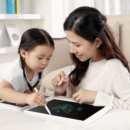 Xiaomi Mijia 20-Inch Electronic Handwriting Tablet with Pen shown being used by mother and child for drawing and notes