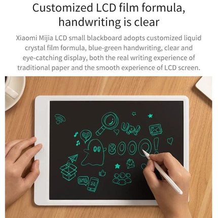 Xiaomi Mijia 20-Inch Electronic Handwriting Tablet with Pen showing clear blue-green LCD handwriting and stylus on wooden desk