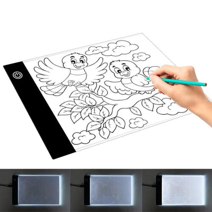 A5 Acrylic Sketch Board for Drawing and Tracing with hand tracing a bird drawing on illuminated acrylic board