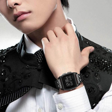 SKMEI Men's Waterproof Outdoor Sports Digital Watch worn on wrist of stylish man in black suit, sleek metal band and digital display