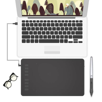 Huion Inspiroy Drawing Tablet with Battery-Free Stylus for Artists shown connected to laptop with stylus and glasses, ideal for sketching, photo editing, and travel