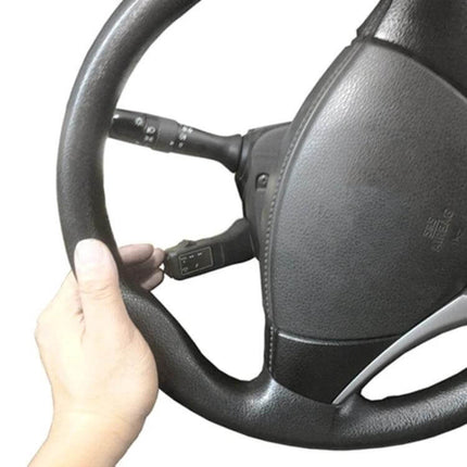 Steering Wheel Controller For Cars With Volume And Track Control mounted on steering wheel for on-wheel audio volume and track control
