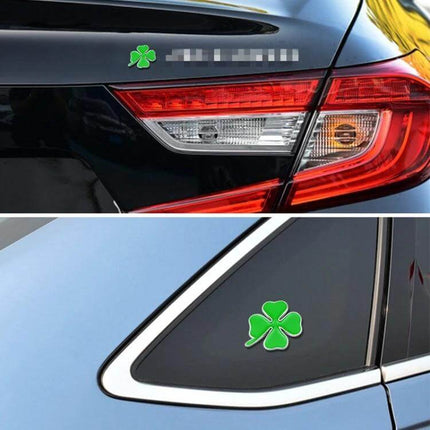 Set of 2 Metal Four Leaf Clover Car Decoration Stickers on black car trunk and rear window, green clover decals for exterior personalization
