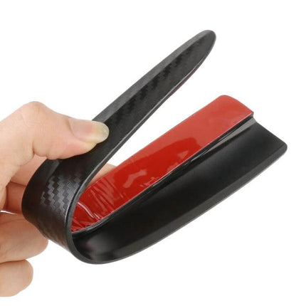Carbon Fiber Silicone Bumper Strip for Car Door Protection showing flexible strip with adhesive backing being peeled