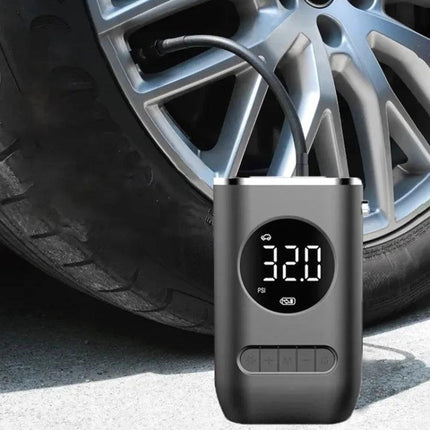 Compact Portable Tire Inflator for Everyday Vehicle Maintenance — compact digital inflator plugged into car tire showing 32.0 PSI