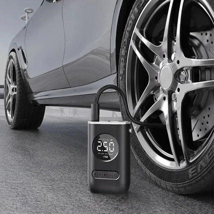 Compact Portable Tire Inflator for Everyday Vehicle Maintenance compact inflator plugged into car lighter inflating a low tire