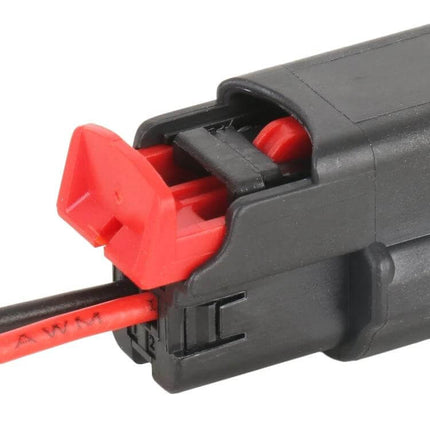 Toyota Fog Light Switch With Cable For Front Panel Use - close-up 2-wire female plug-and-play connector with red locking tab