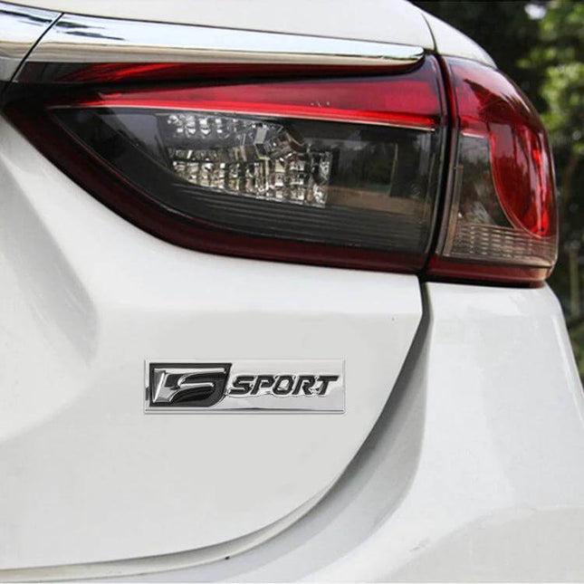 Personalized Aluminum Alloy Stickers for F-SPORT Cars on white sedan rear near taillight, chrome F-SPORT emblem applied