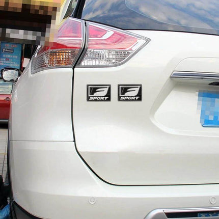 F-Sport Aluminum Alloy Personalized Car Stickers, Type D on white SUV trunk showing dual black F-Sport mini emblems near taillight