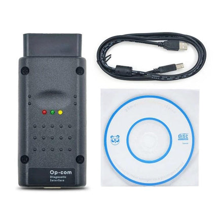 OPCOM Diagnostic Tool for Routine Car Maintenance Checks - black diagnostic interface with USB cable and software disc
