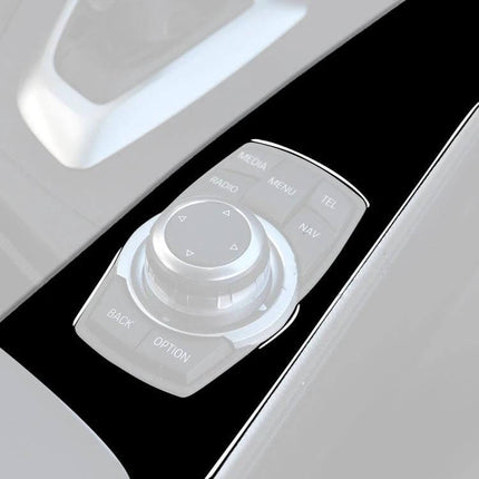 BMW Decorative Sticker for Left-Drive Car Panel installed on glossy black center console around iDrive controller, ABS decorative dashboard trim