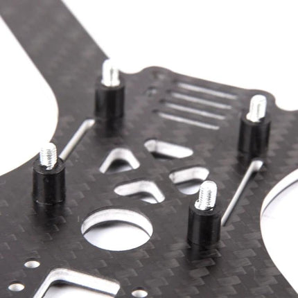 iFlight M2 VD Rubber Shock Absorbers for FPV Drone Flight Controllers mounted on carbon fiber FC plate showing rubber standoffs and screws
