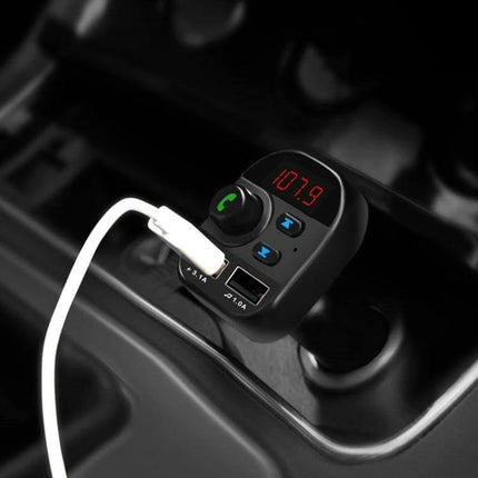 Dual USB Bluetooth FM Transmitter Car Kit MP3 Player plugged into car cigarette lighter with USB charging cable and FM display 107.9