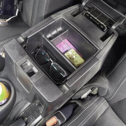 Practical Storage Organizer for Jeep Wrangler JK 2011-2017 installed in center console holding sunglasses and small items