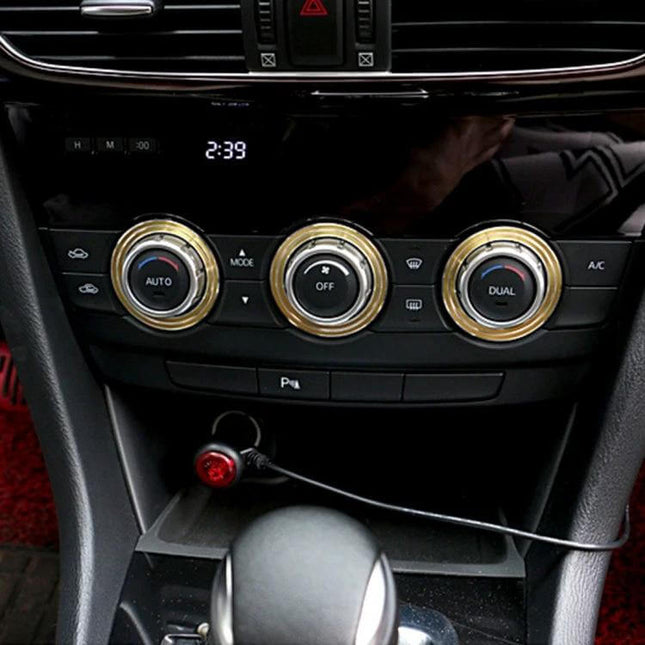 Set of 3 Aluminum Air Conditioner Knob Covers for Mazda ATENZA installed on dashboard showing three gold knob covers