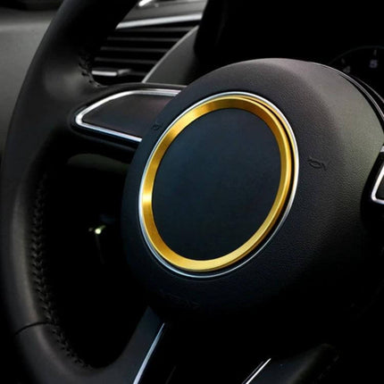 Aluminum Steering Wheel Decoration Ring for Audi Vehicles gold trim installed on black steering wheel interior