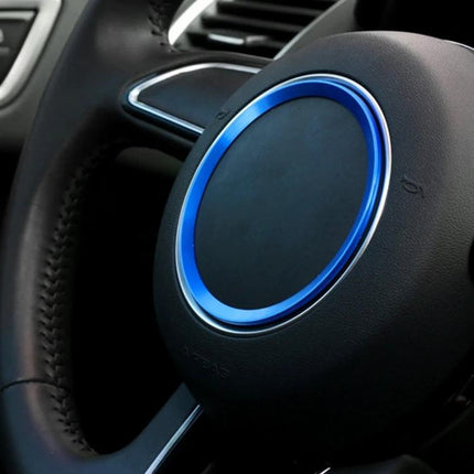 Aluminum Steering Wheel Decoration Ring for Audi Vehicles shown in blue on a black Audi steering wheel interior