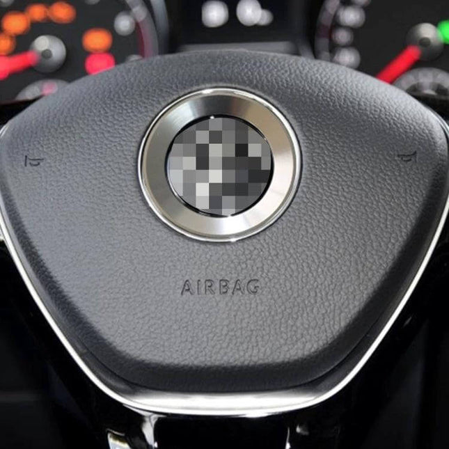 Aluminum Steering Wheel Decoration Ring for Volkswagen Vehicles installed on black steering wheel, brushed aluminum detail enhancing interior