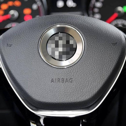 Aluminum Steering Wheel Decoration Ring for Volkswagen Vehicles installed on black VW steering wheel, brushed aluminum finish accent