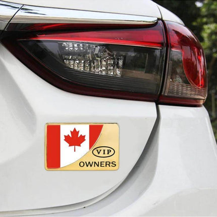 Canada Flag Rectangular Metal Decorative Car Sticker in Gold on white car trunk showing gold maple leaf VIP owners decal