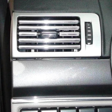 SHENHAO Set of 10 U-Shaped Air Vent Decoration Trims for Cars installed on a silver car dashboard air vent, close-up view