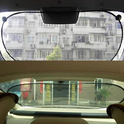 Foldable Car Window Shade for Blocking UV Rays in Back Seats installed on a minivan back window protecting rear passengers from sun glare