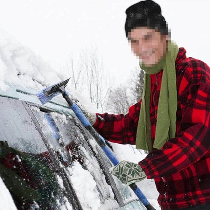Extendable Car Snow Brush with Ice Scraper and Squeegee for Winter Use - person using extendable brush to clear windshield snow