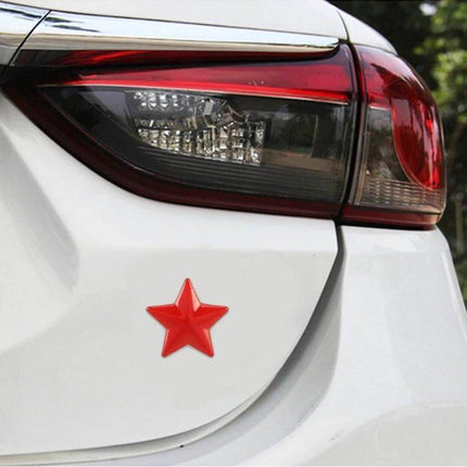 Metal Star Pattern Decorative Sticker for Car Body in Red applied to white car rear near taillight, removable automotive accent