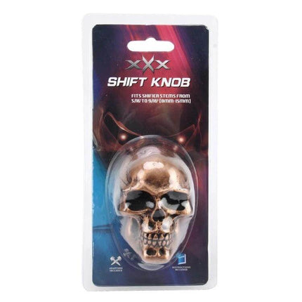 Comfortable Skull Shaped Gear Shift Knob for All Cars in blister pack showing bronze skull design and ergonomic grip