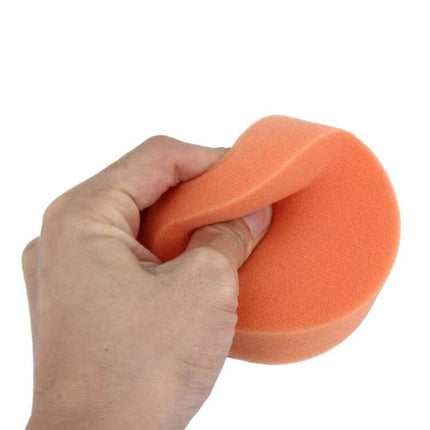 Round Car Wax Sponge Set, 12 Pieces for Vehicle Cleaning - hand holding round orange wax sponge showing resilience and dense foam