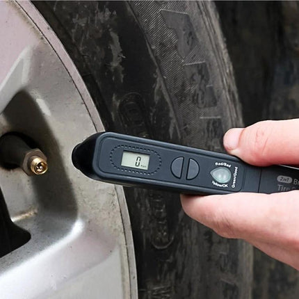 Versatile Aid for Everyday Car Brake and Tire Checks – compact tester checking tire pressure and brake fluid moisture on car wheel