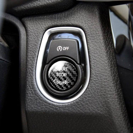 Carbon Fiber Engine Start Button Cover for BMW E Chassis in Black installed on dashboard protecting start/stop button